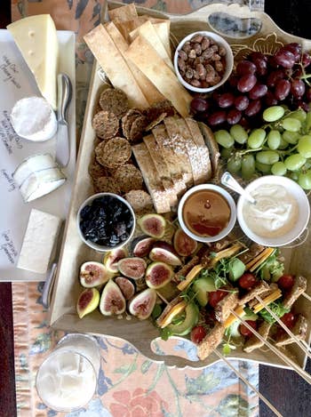reviewer image of a platter they styled with tons of foods
