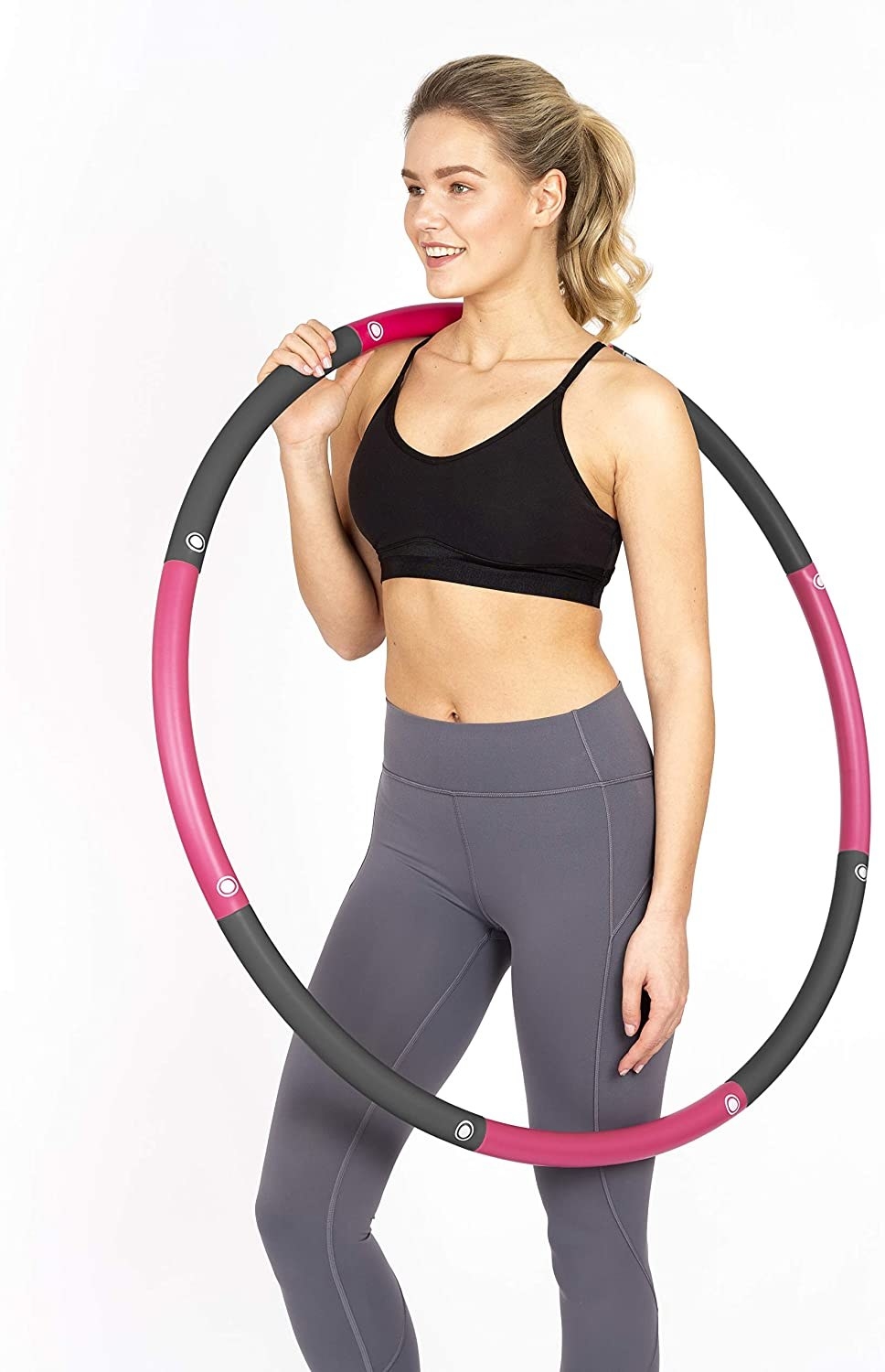 a model holds the weighted hoola hoop