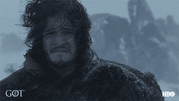 John Snow looking miserable in the snow