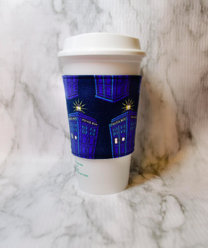 A flannel cup cozy printed with a Tardis