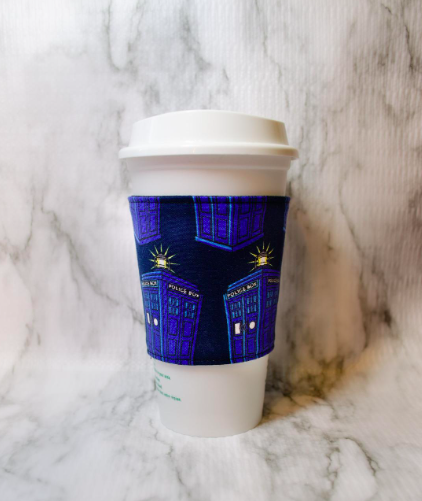 A flannel cup cozy printed with a Tardis