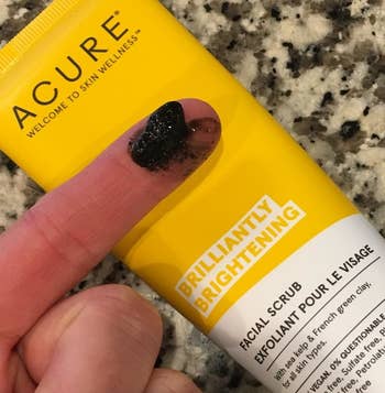 A reviewer showing the texture of the scrub