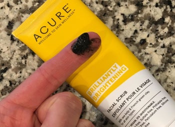 A reviewer showing the texture of the scrub