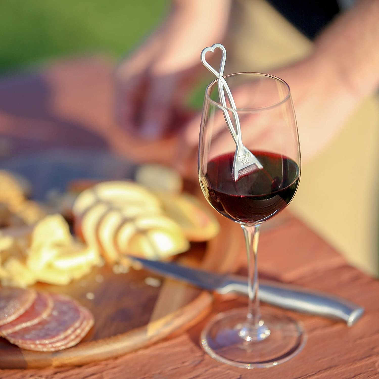 wine stirrer in a glass of wine