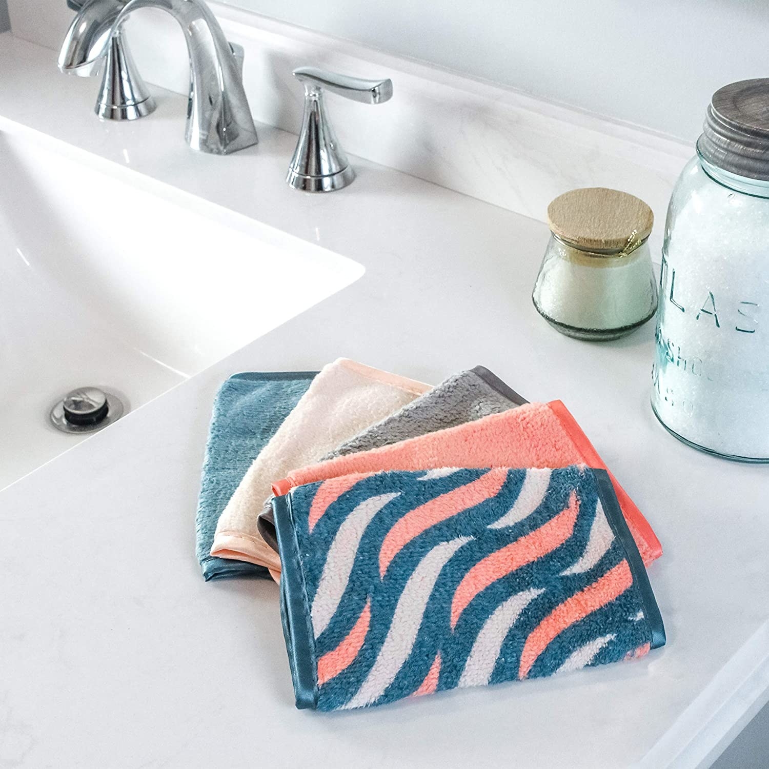 four cloths on a bathroom sink