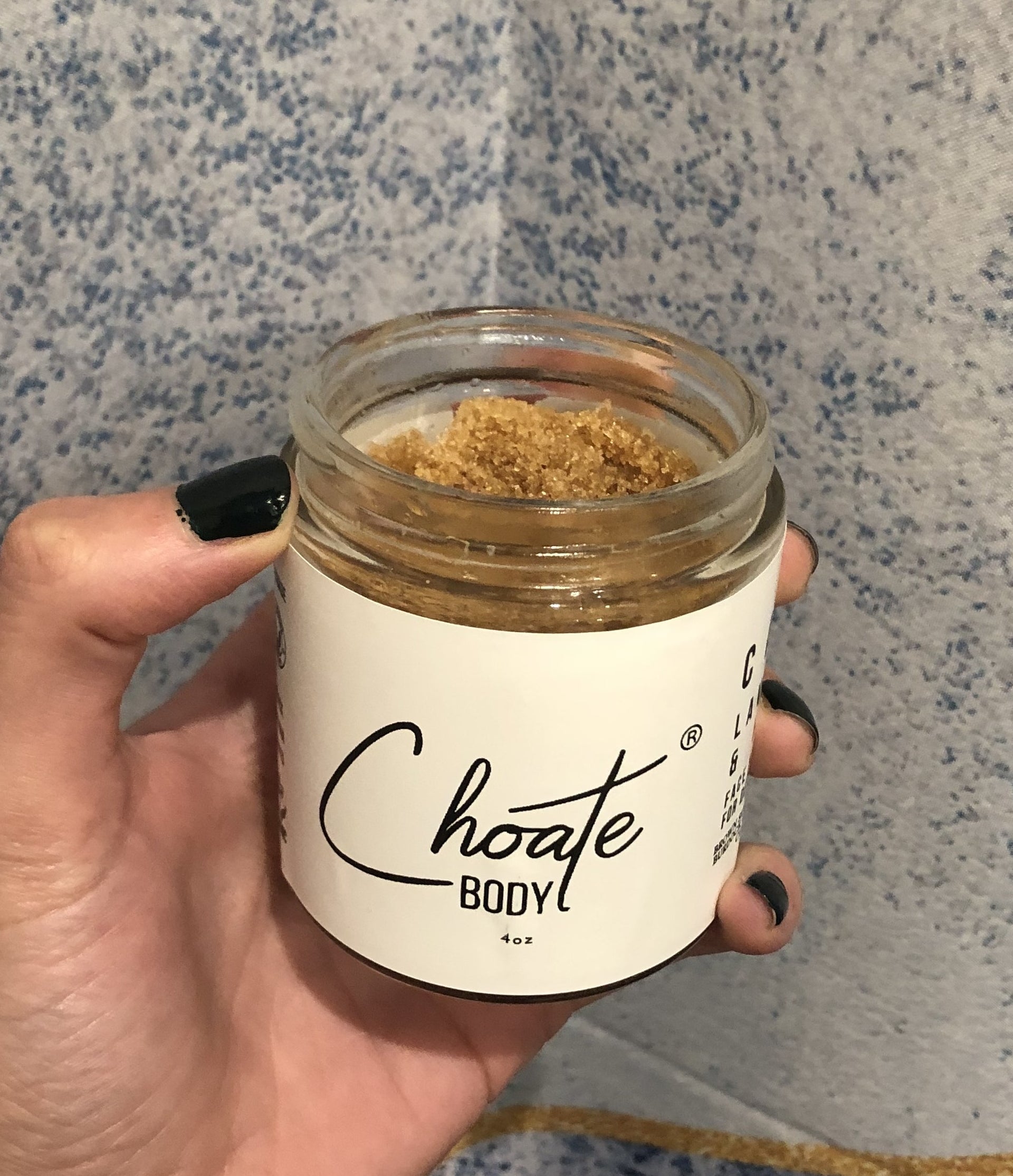 Open jar of same product to show smooth scrub inside