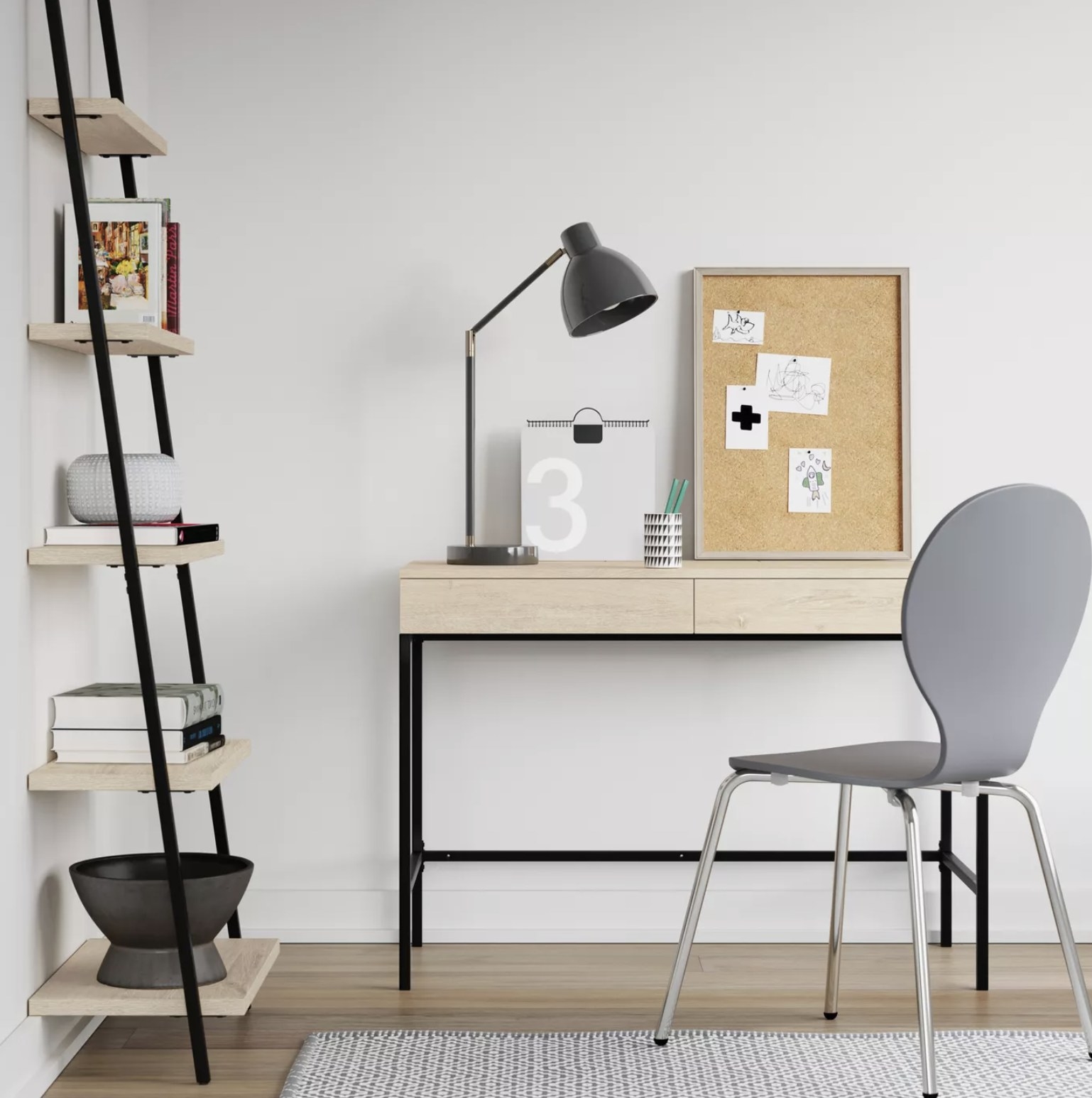 A leaning ladder bookshelf in an office space