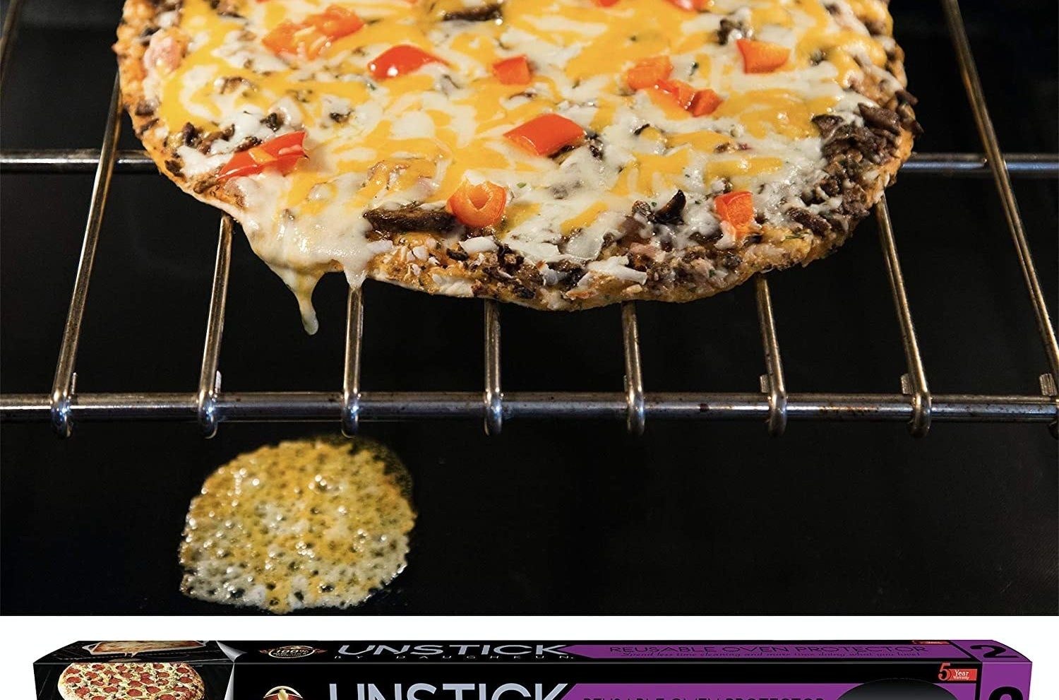 pizza in the oven with cheese dripped onto oven mat