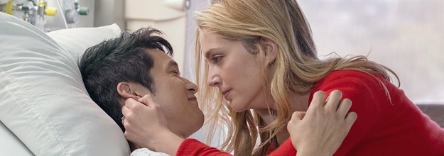 Jenn comforting Sol in his hospital bed