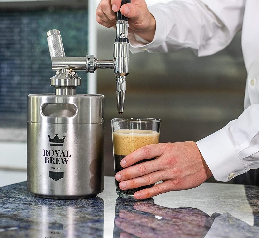 Model pouring nitro cold brew from keg
