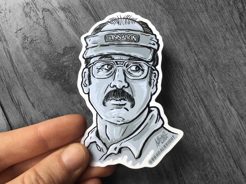 A hand drawn and cut sticker of Gene/Saul wearing a Cinnabon visor from Better Call Saul