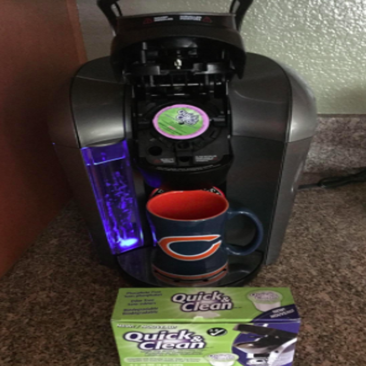 K-cup machine with the cleaning pod in it