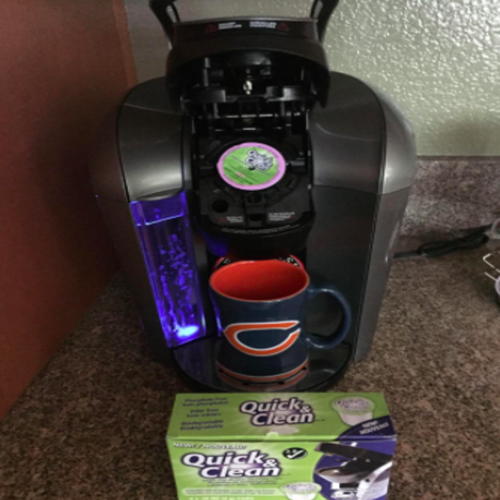 K-cup machine with the cleaning pod in it