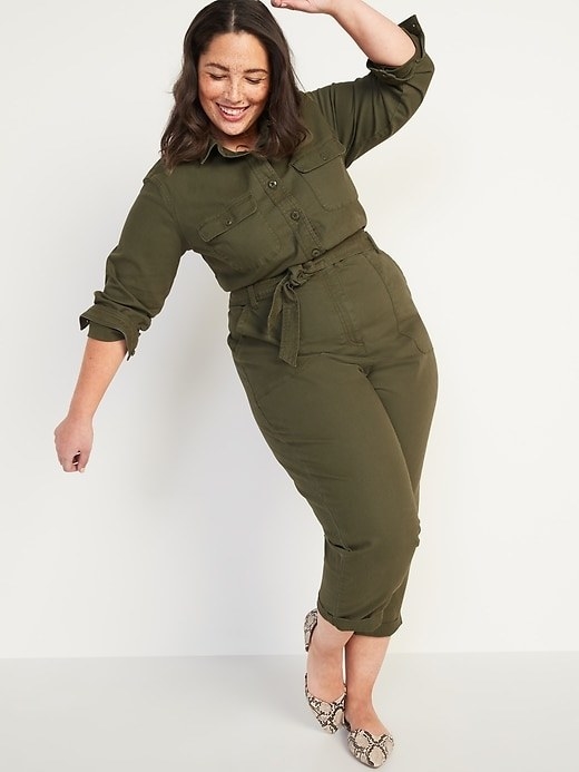 Model in the jumpsuit with removable tie belt