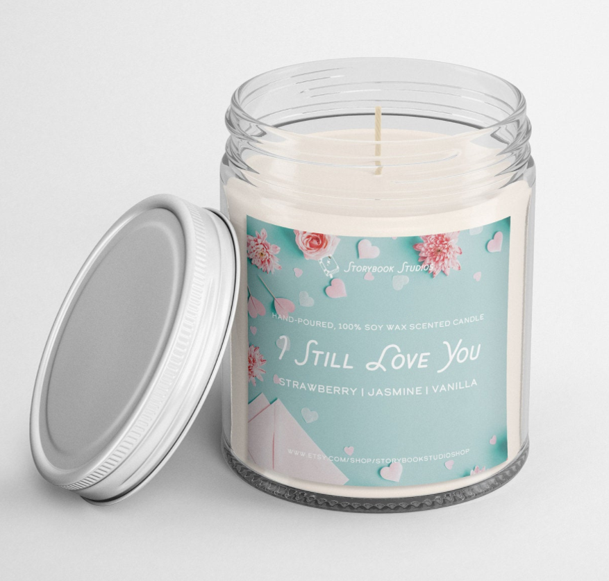 A jar candle with lid and a label that says I still Love You