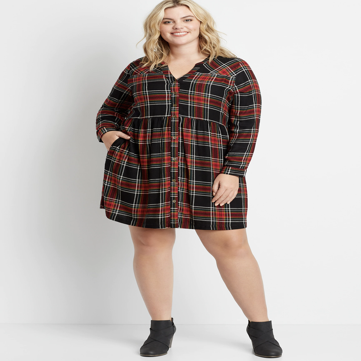 model wears long sleeve button down dress