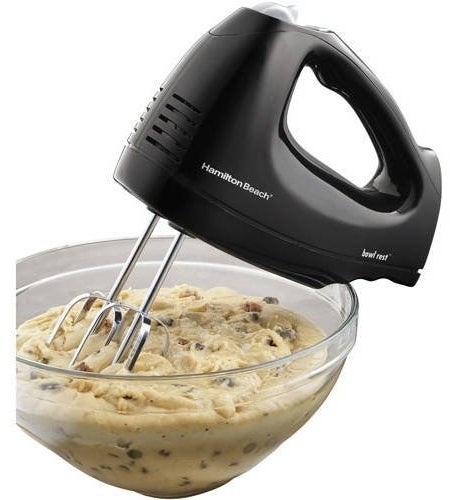 The black mixer and a bowl of cookie dough