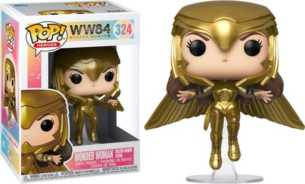 A Funko Pop! of Wonder Woman posed like she&#x27;s flying, wearing gold armor that has wings