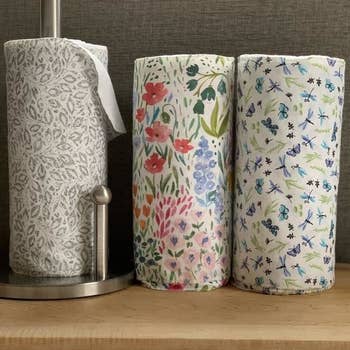 Three rolls of reusable towels in flower garden, soft gray vine, and butterfly dragonfly