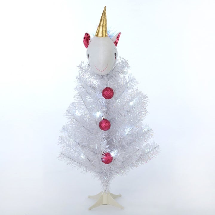 The mini white tree with cute unicorn head 