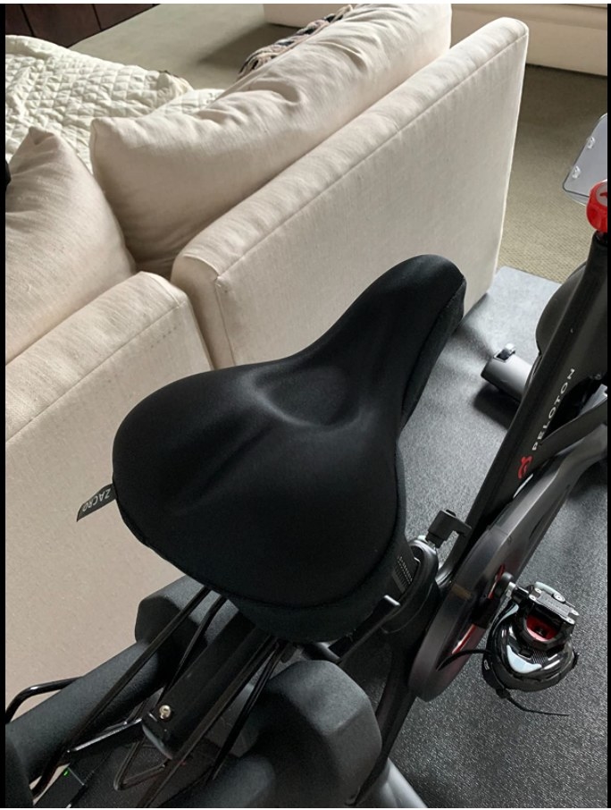A padded gel seat on a Peloton bike.