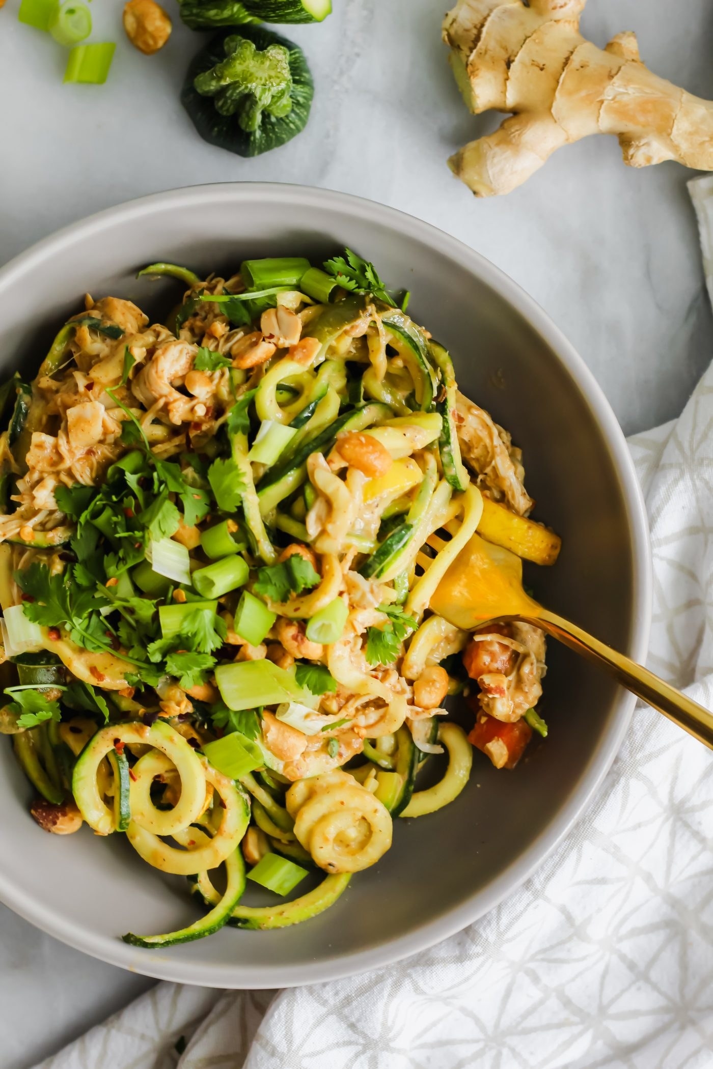 Zucchini noodle pad Thai in a bowl.