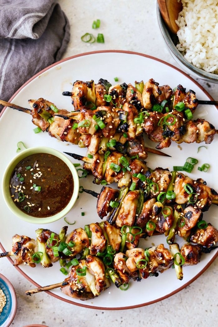 Skewers of chicken yakitori on a plate.