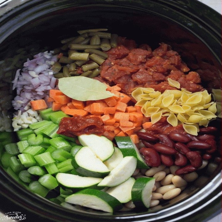Ingredients for minestrone soup in a slow cooker.