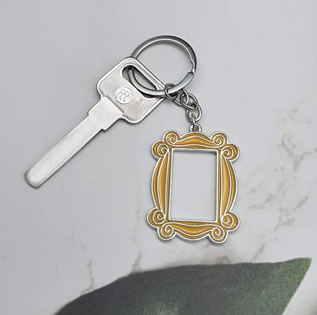 peephole frame keychain with a key