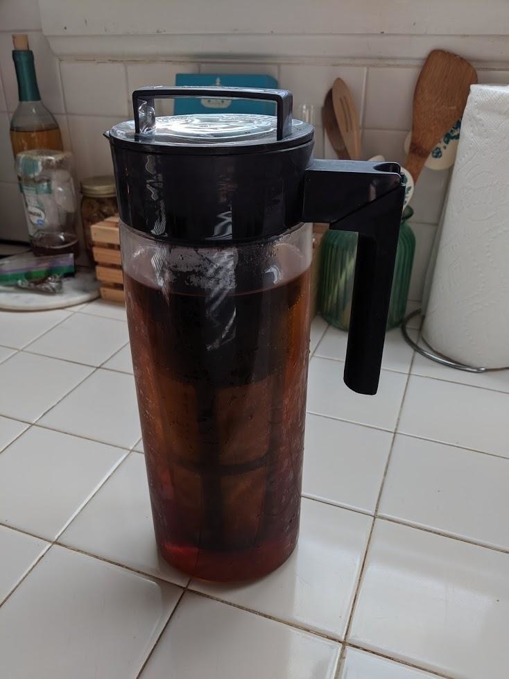 reviewer image of the takeya cold brew maker full of coffee