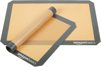 Two of the mats; one rolled up to show its flexibility 