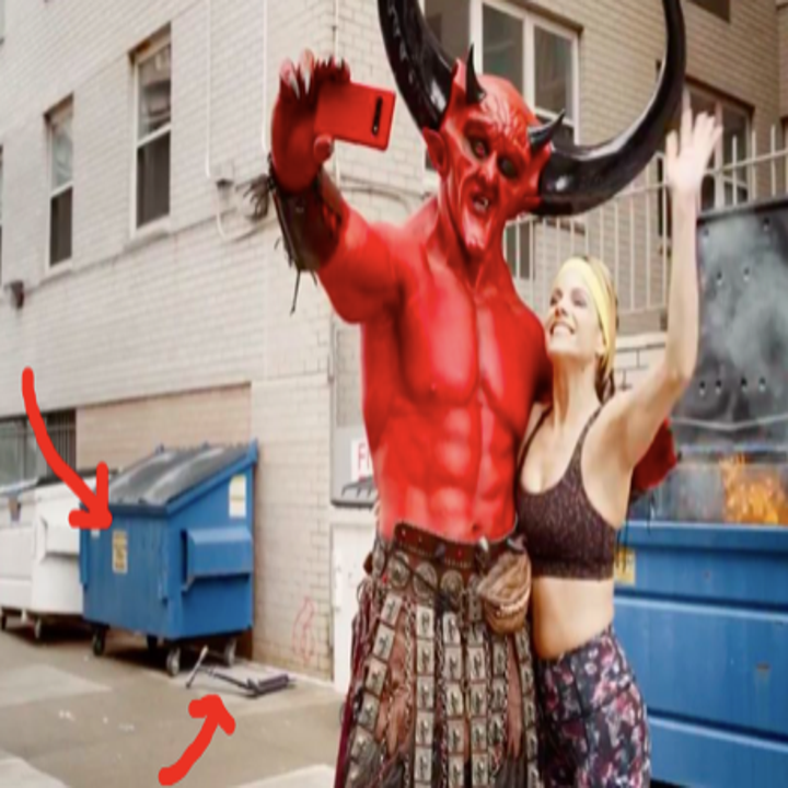 The Devil and 2020 posing in front of a dumpster trash fire with a scooter in the background