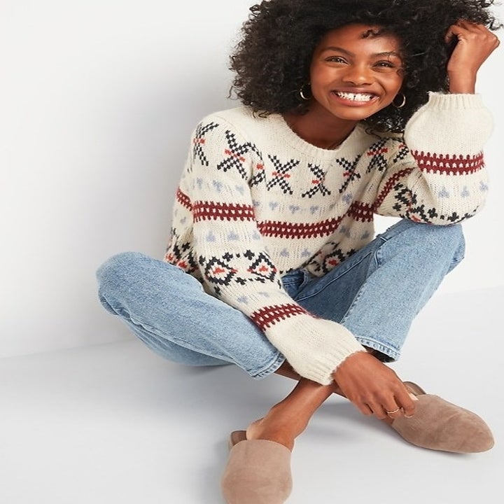a model in a fair isle sweater