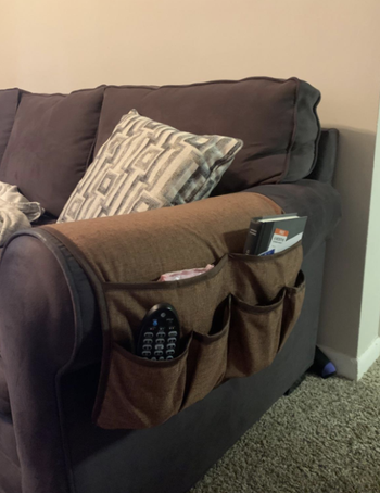 Reviewer sofa with the organizer sitting on the arm