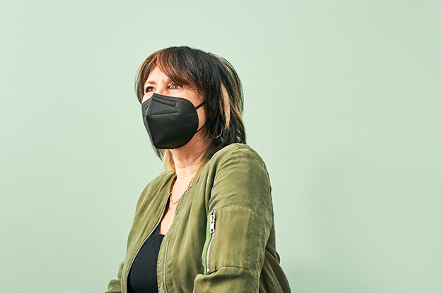 Middle-aged woman models KN95  mask