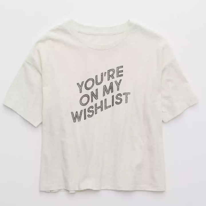 a white tee that says "you're on my wishlist"