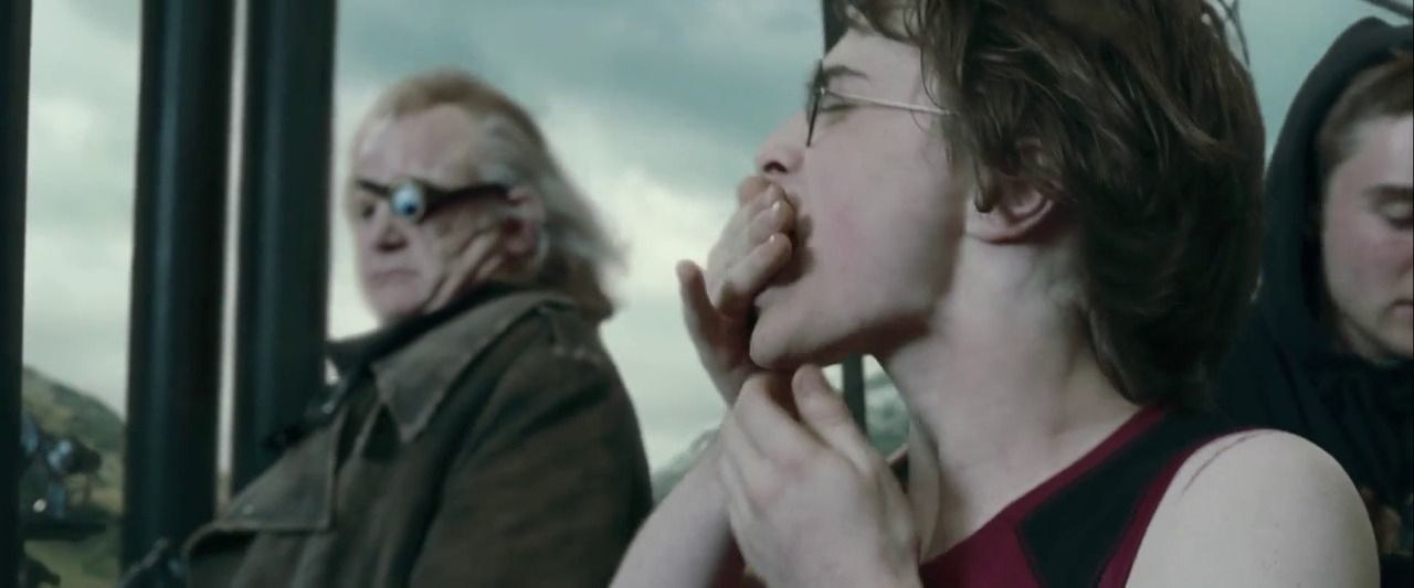 Harry eating a handful of gillyweed