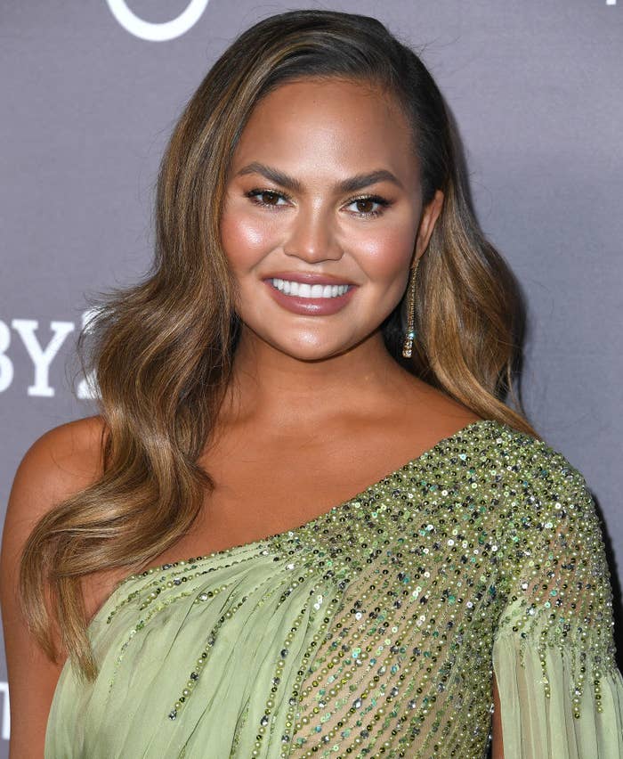 Chrissy Teigen at a red carpet