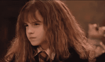 Hermione looking shifty-eyed