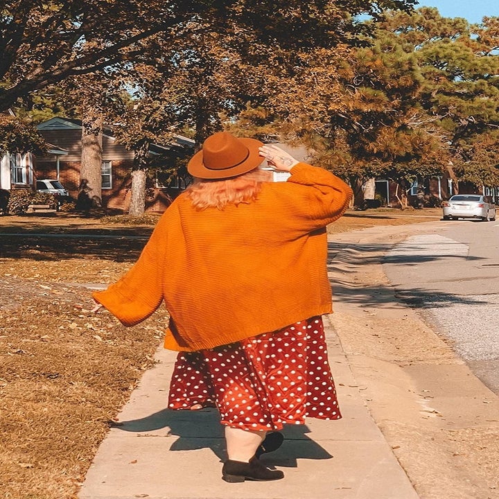 the back of the cardigan on a reviewer 