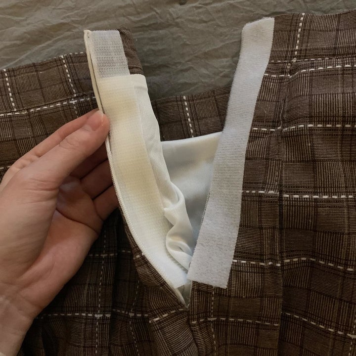 Reviewer photo of the Velcro strips applied to a pant fly 
