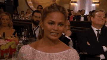 Chrissy Teigen gives her iconic cringe face at the &quot;Golden Globes&quot;