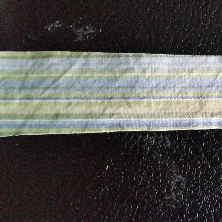 A reviewer photo of the same fabric with the edges folded under using the seam sealant and showing no fraying 