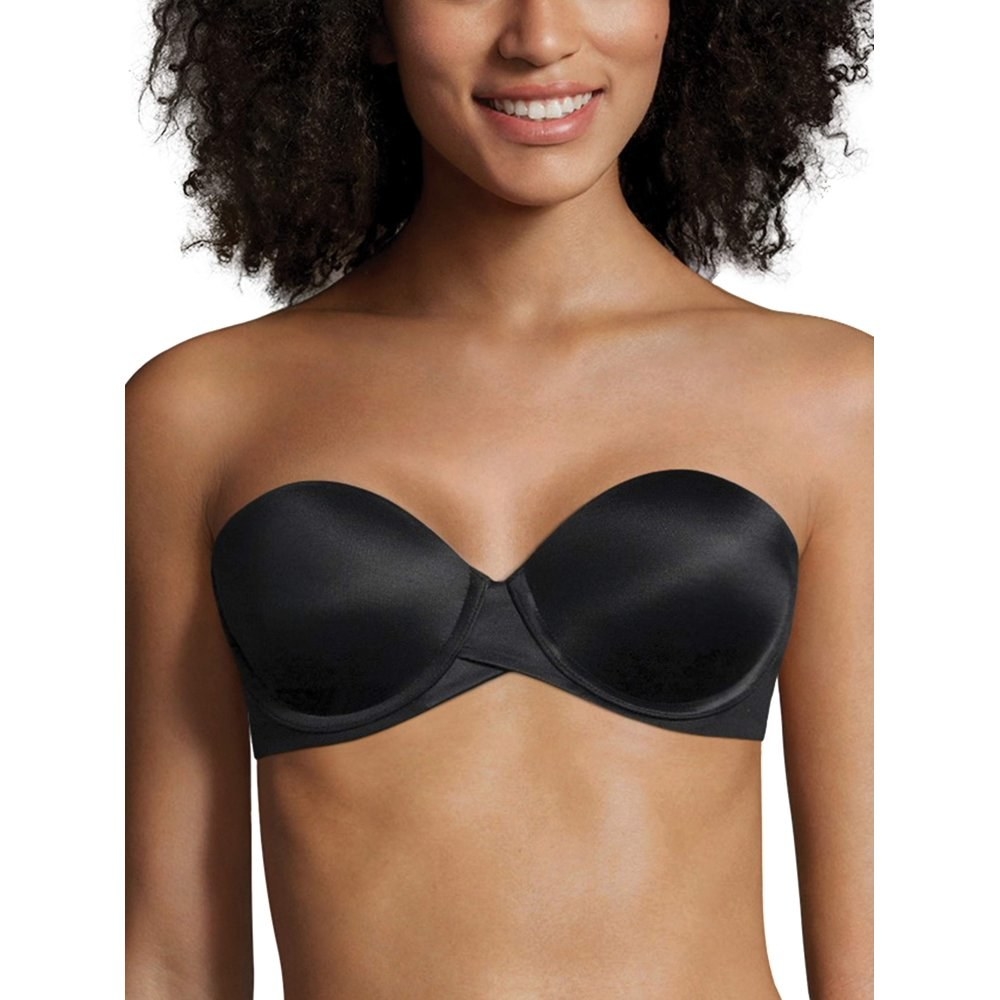 model wears strapless black bra 