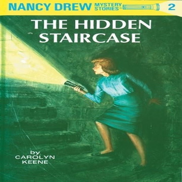 the cover of the first Nancy Drew book in the series, "The Hidden Staircase"