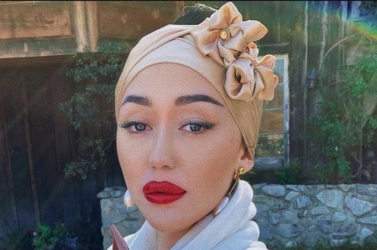 Noah Cyrus smoking a cigar