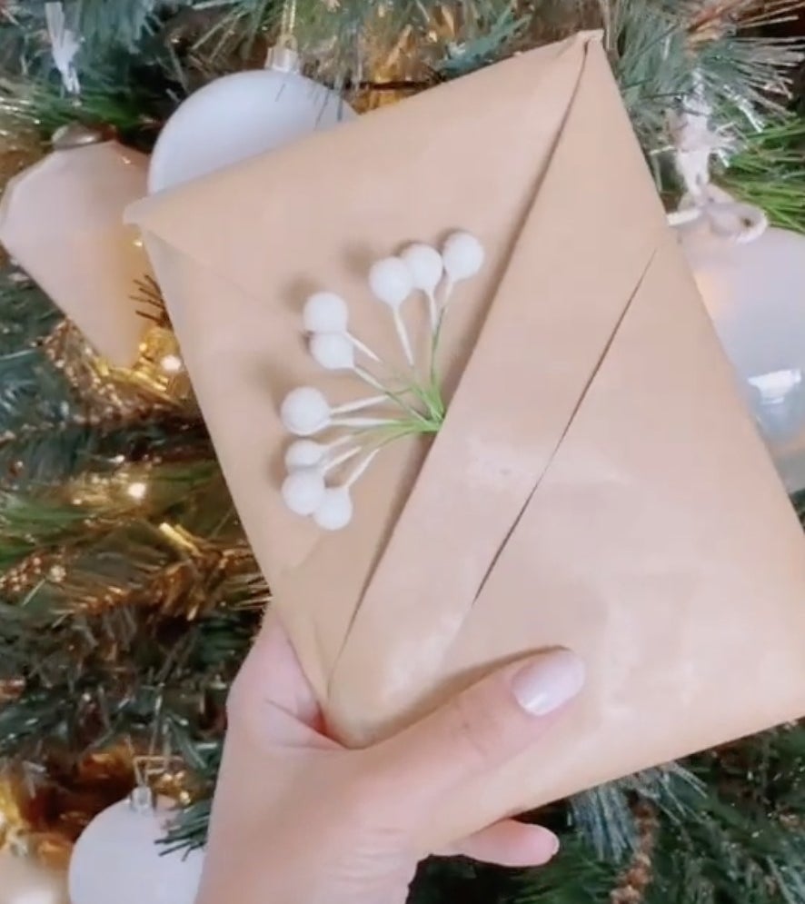 A present with a fold so that a flower can be inserted