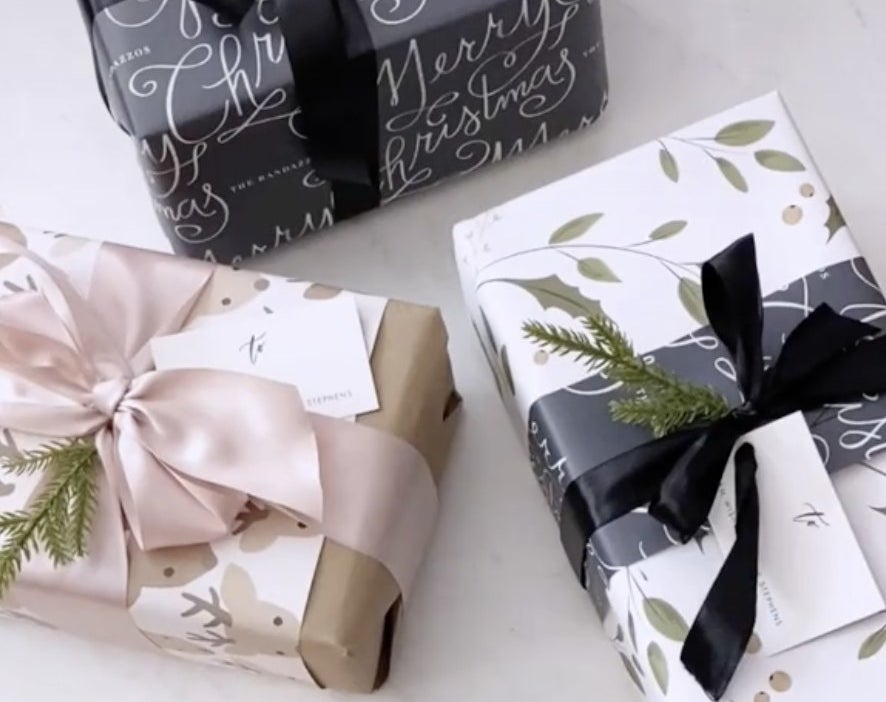 Boxes wrapped using multiple wrapping paper prints