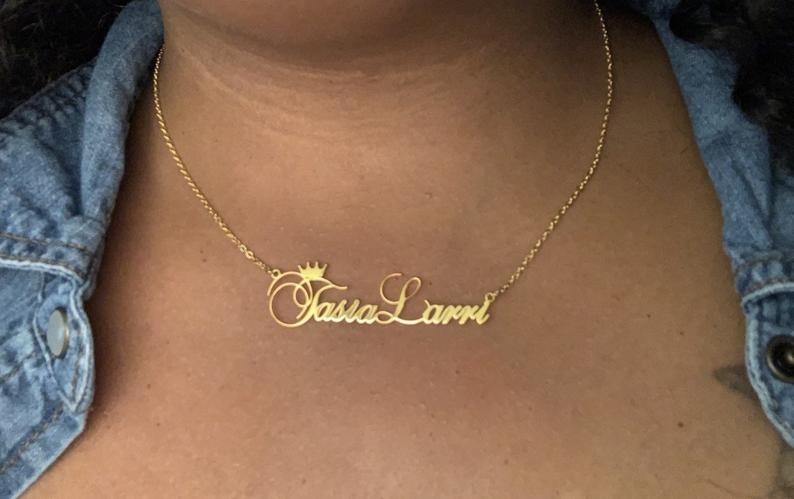 Personalized name plate necklace with a gold chain