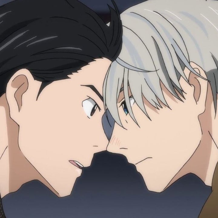 A closeup of Victor and Yuri looking at each other